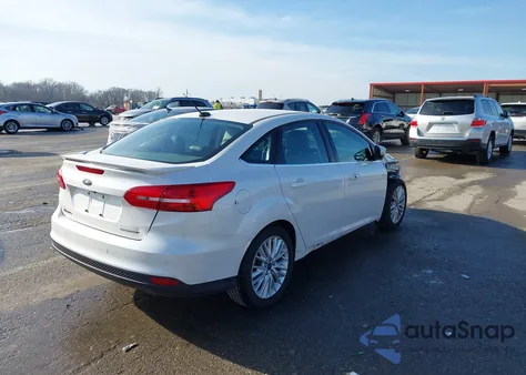 2017 Ford Focus Titanium z USA, uszkodzony, nr VIN 1FADP3J24HL230297